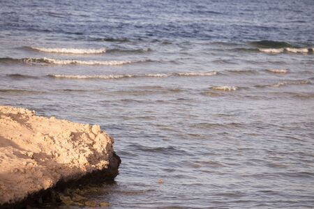 Sea waves by the beach summer backgroundの写真素材