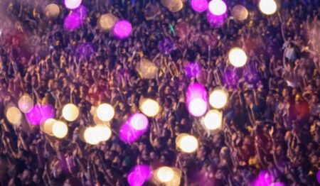 Crowd at summer festival blurred backgroundの写真素材