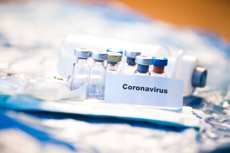 Coronavirus vaccines bottles medical backgroundの写真素材