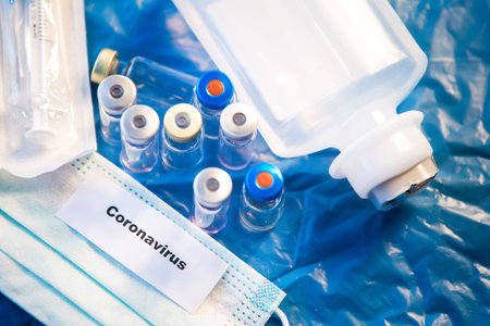 Coronavirus vaccines bottles medical background