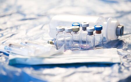 Coronavirus vaccines bottles medical backgroundの写真素材
