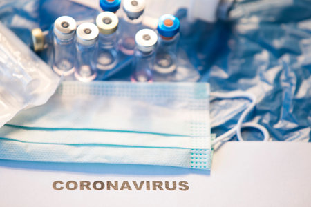 Coronavirus vaccines bottles medical background