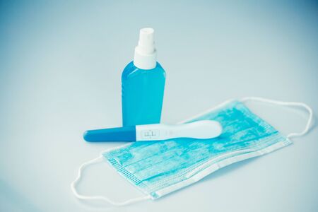 Positive pregnancy test in coronavirus pandemicの写真素材