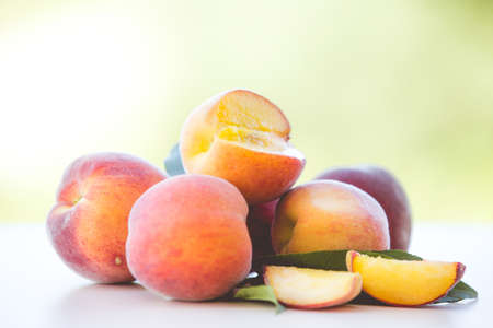 Organic cultured ripe peach fruitsの写真素材
