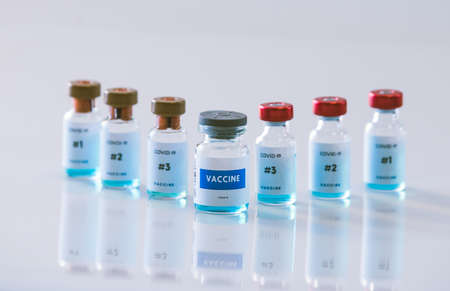 Covid vaccine bottles. Coronavirus medical backgroundの写真素材