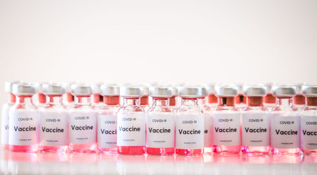 Covid vaccine bottles. Coronavirus medical background
