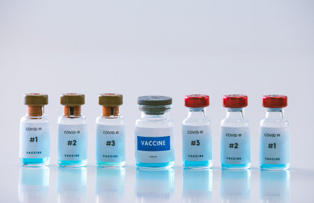 Coronavirus vaccines bottles medical backgroundの写真素材