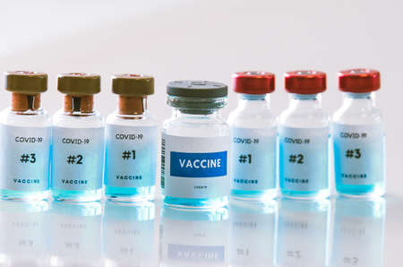 Coronavirus vaccines bottles medical backgroundの写真素材