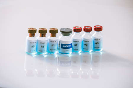 Covid 19 vaccine bottles medical backgroundの写真素材