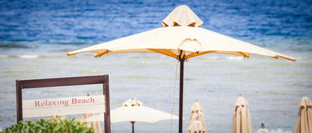 Beach umbrella summer sea backgroundの写真素材