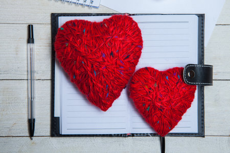 Valentines day. Valentines day greeting card. Heart on a wooden background. Heart of love.の写真素材