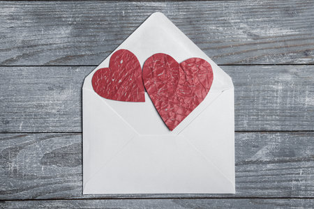 Valentines day. Valentines day greeting card. Heart on a wooden background. Heart of love.の写真素材