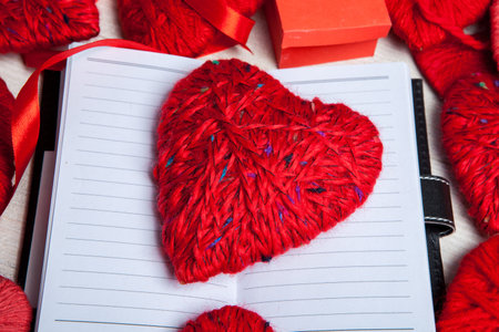 Valentines day. Valentines day greeting card. Heart on a wooden background. Heart of love.