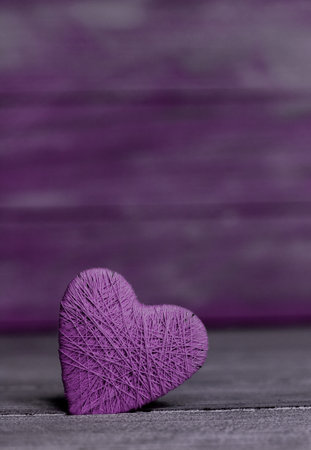 Valentines day. Valentines day greeting card. Heart on a wooden background. Heart of love.の写真素材
