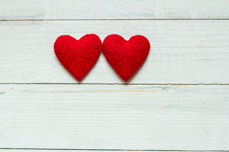 Valentines day. Valentines day greeting card. Heart on a wooden background. Heart of love.の写真素材