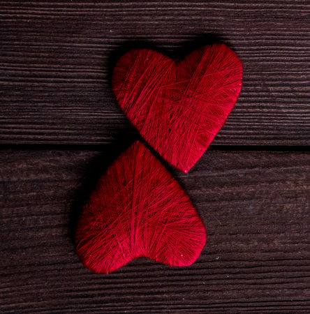 Valentines day. Valentines day greeting card. Heart on a wooden background. Heart of love.の写真素材