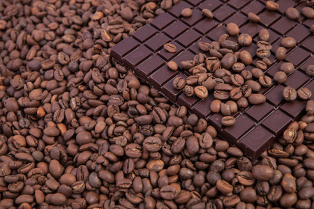 Cup of coffee on the coffee beans background