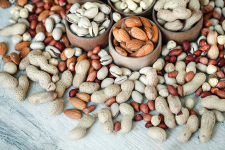 Assorted nuts for a background Almond, walnut,cashew, pistachios, hazelnuts, peanuts, Macadamia