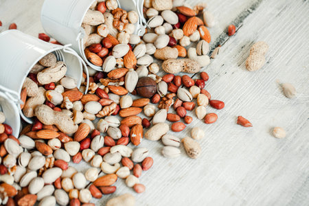 Assorted nuts for a background Almond, walnut,cashew, pistachios, hazelnuts, peanuts, Macadamiaの写真素材