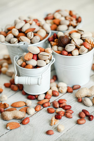 Assorted nuts for a background Almond, walnut,cashew, pistachios, hazelnuts, peanuts, Macadamiaの写真素材