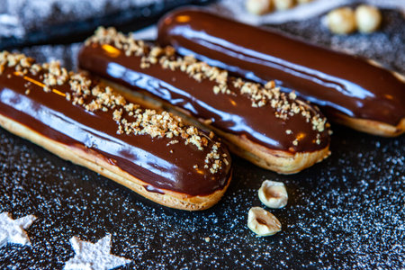 Traditional french eclairs with chocolate. Tasty dessert. Home made cake eclairs. Sweet Dessert...