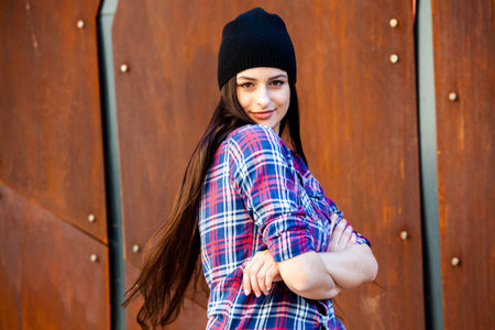 Beautiful young woman with clean perfect skin.Fashion Portrait of Stylish Pretty Brunette. Sensual...