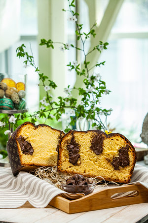 Panettone is the traditional Italian dessert for easter in 2021. Homemade panettone covered in...