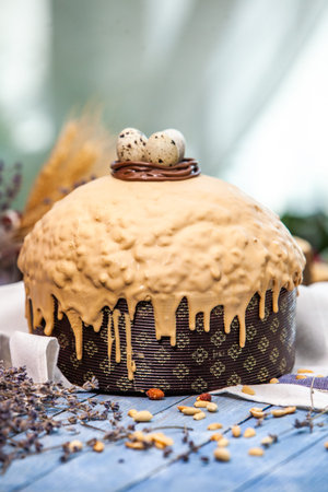 Panettone is the traditional Italian dessert for easter in 2021. Homemade panettone covered in...