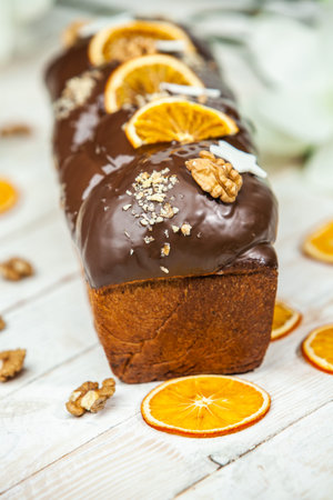 Panettone is the traditional Italian dessert for easter in 2021. Homemade panettone covered in...