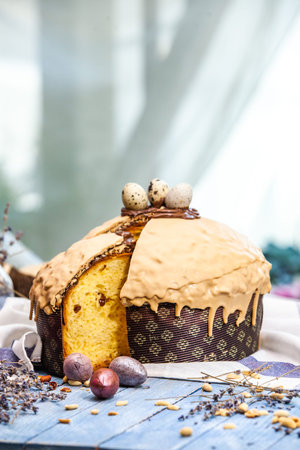 Panettone is the traditional Italian dessert for easter in 2021. Homemade panettone covered in...