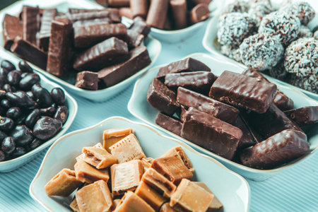 Assortment of delicious chocolate candies background. Chocolate candy isolatedの写真素材
