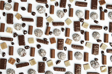 Assortment of delicious chocolate candies background. Chocolate candy isolated