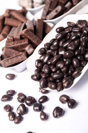 Assortment of delicious chocolate candies background. Chocolate candy isolated
