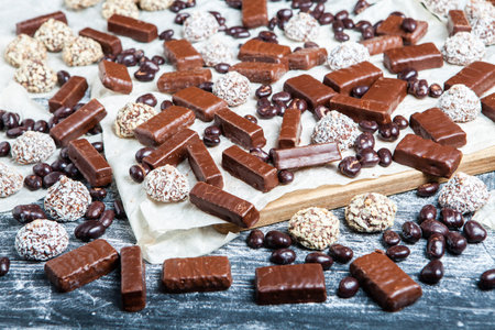 Assortment of delicious chocolate candies background. Chocolate candy isolated