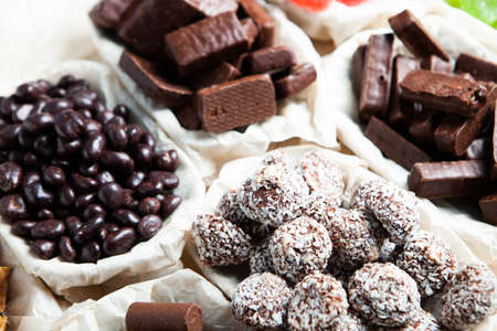 Assortment of delicious chocolate candies background. Chocolate candy isolatedの写真素材