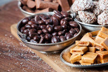 Assortment of delicious chocolate candies background. Chocolate candy isolatedの写真素材