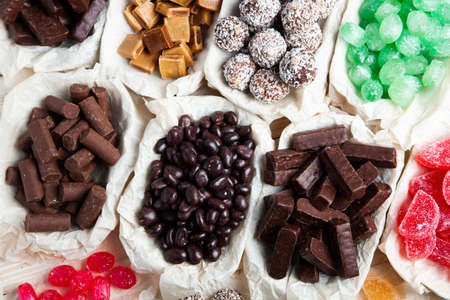 Assortment of delicious chocolate candies background. Chocolate candy isolatedの写真素材