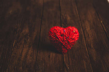 Love hearts on wooden texture background. Valentines day card concept. Heart for Valentines Day Background.の写真素材
