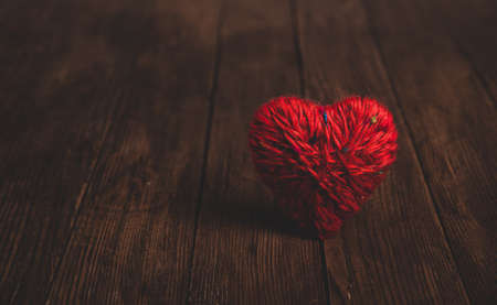 Love hearts on wooden texture background. Valentines day card concept. Heart for Valentines Day Background.の写真素材