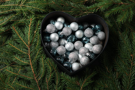 New Year's Eve background with fir branch and cones. Christmas and New Year holidays composition of...