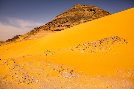 beautiful orange sand dunes in the desert of moroccoの写真素材