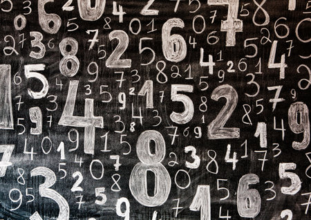 Numbers on grunge blackboard. Abstract background and texture for design.の写真素材