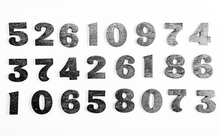 Wooden numbers on a white background. Numbers from zero to nine.の写真素材