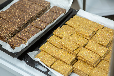 Cereal bars on display in a bakery shop, close upの写真素材