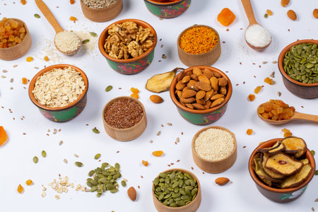 Healthy food background. Assortment of dried fruits, nuts, seeds and grains.の写真素材