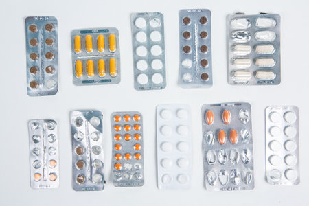Pills in blister packs isolated on white background. Top view.の写真素材