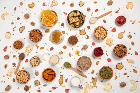 Healthy eating concept. Assortment of nuts and dried fruits on white background.の写真素材