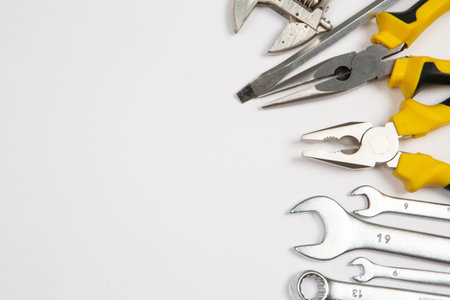 Set of tools on white background. Top view. Copy space.