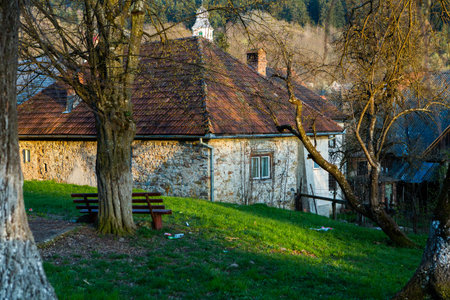 Old stone house in the city park. Springtime. Ukraine, Europe.の写真素材