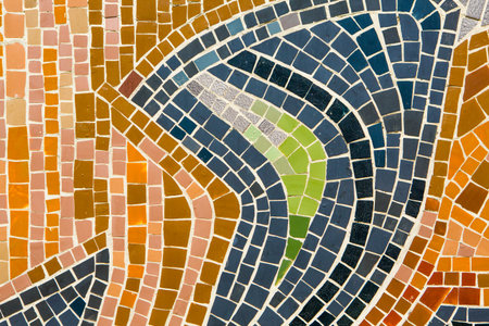 Colorful ceramic mosaic on the walls of the building. Abstract background